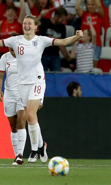 England beats Japan 2-0 to clinch top spot in Group D